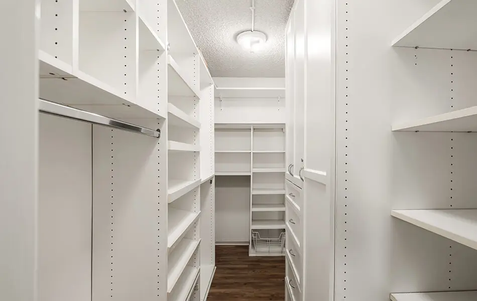 Walk-in closet with built-in shelving at 11550 Nebraska Ave 1 bedroom condo West LA