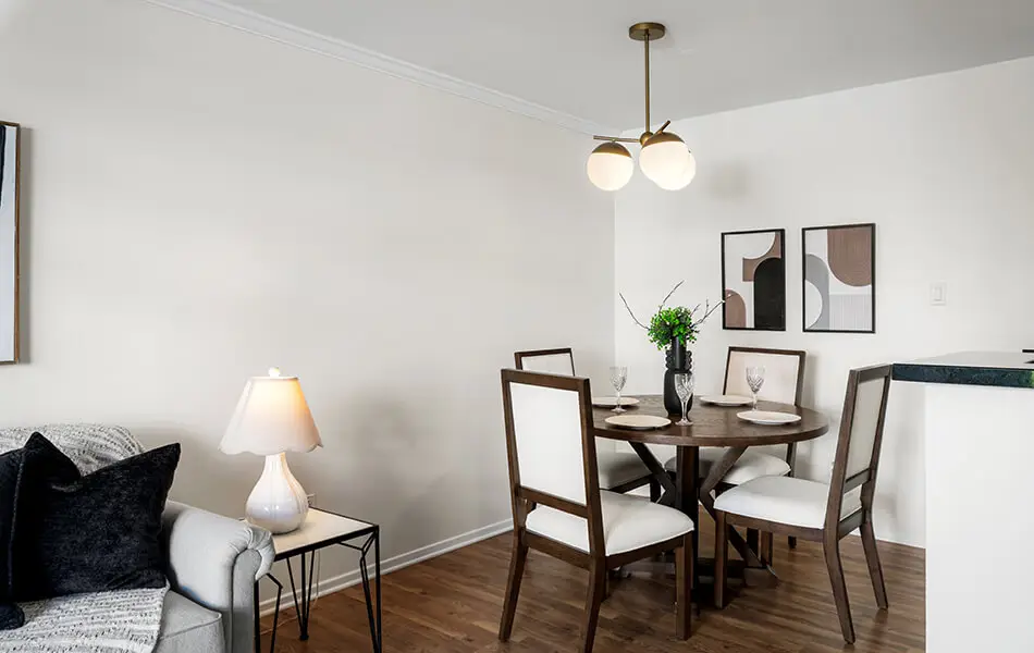 Dining nook with globe chandelier and round table at 11550 Nebraska Ave west LA condo
