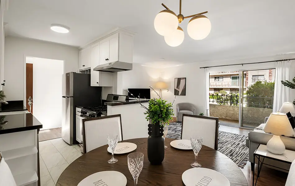 Dining area and kitchen open concept view at 11550 Nebraska Ave westside condo for sale